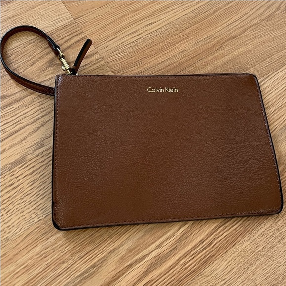 Calvin Klein Handbags - 🦋CALVIN KLEIN faux leather brown wristlet